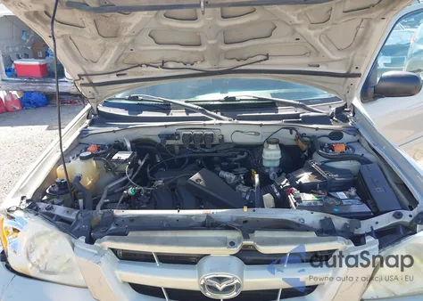 2005 Mazda Tribute S из США, поврежденный, VIN 4F2CZ06175KM49688